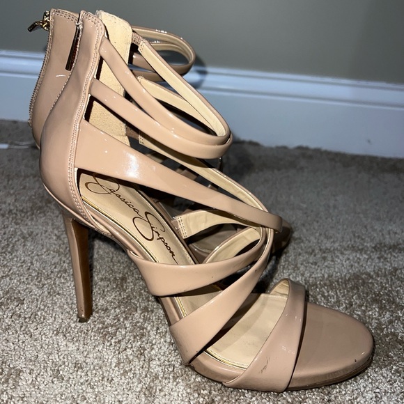 Never worn strappy 4.5 inch heels with a zipper back. Fits true to size. - Picture 2 of 4